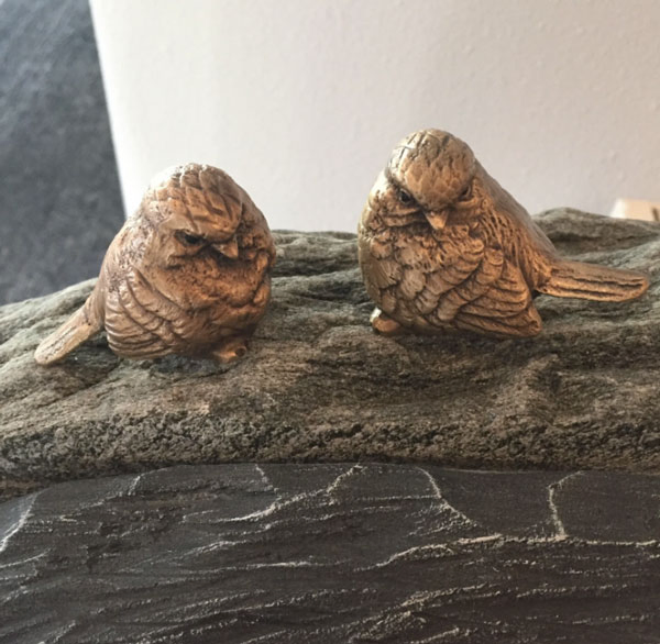 Kleine bronzen vogeltjes